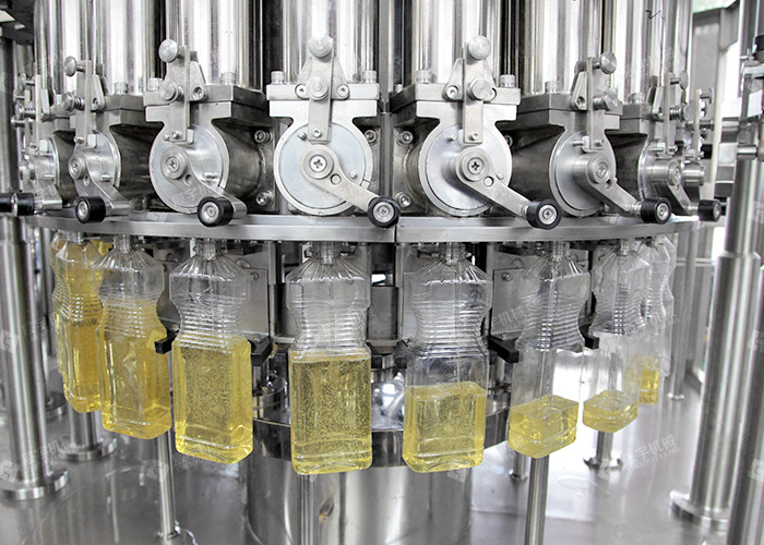 旋轉(zhuǎn)式食用油灌裝機(jī) 旋轉(zhuǎn)式食用油灌裝機(jī)